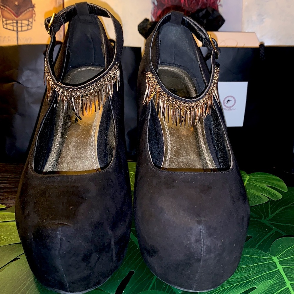 Black suede strap around ankle heels